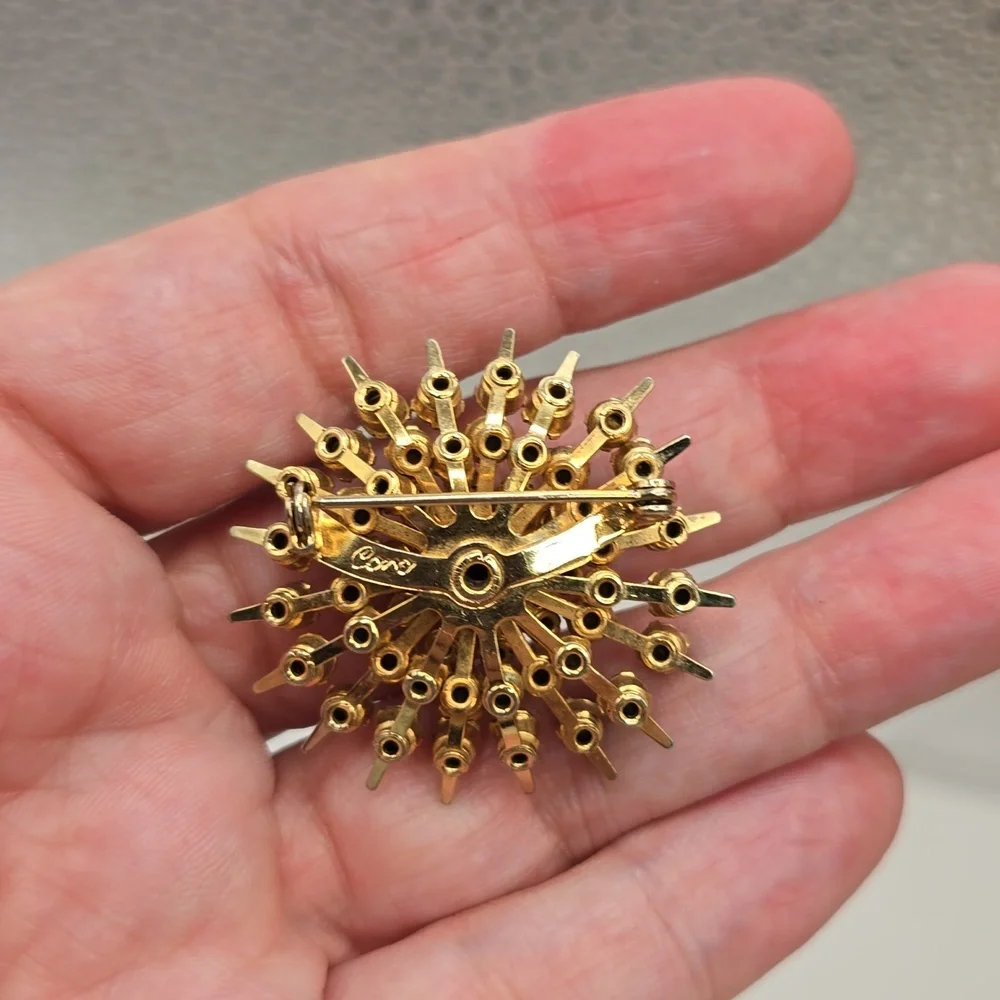 Vintage Coro Purple Rhinestone Starburst Gold Tone Brooch